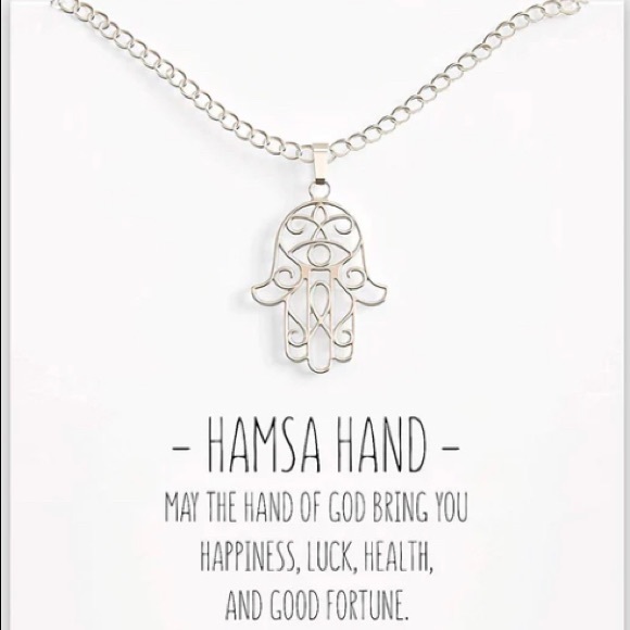 The color is Pink The design includes a hand charm abs a evil eye charm - Picture 3 of 4